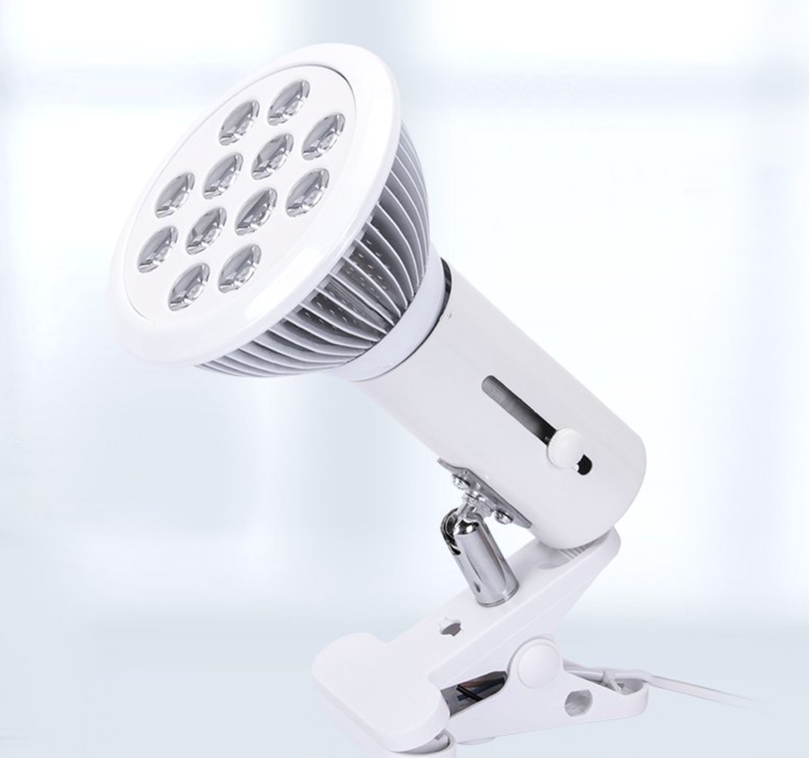 Combination target light therapy lamp with red and near infra red LEDs, strong clip for hands free use; for treatment of face, joints, neck, hands, and other focal parts of body.